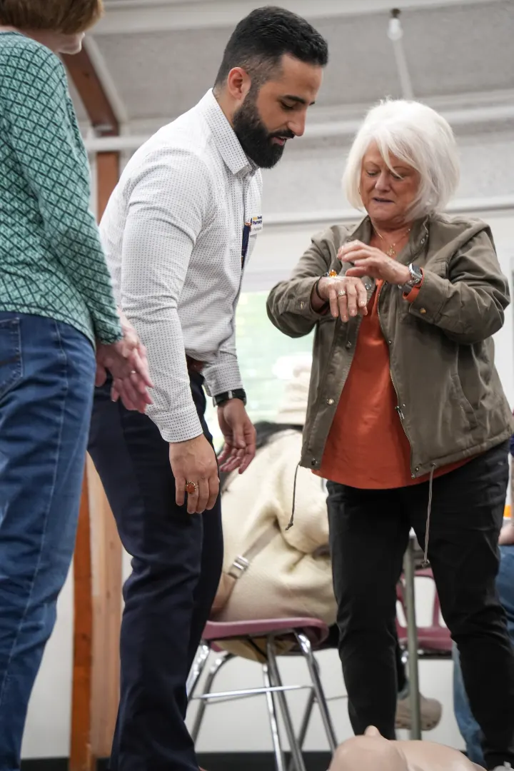 Talking with a guest at the CPR class